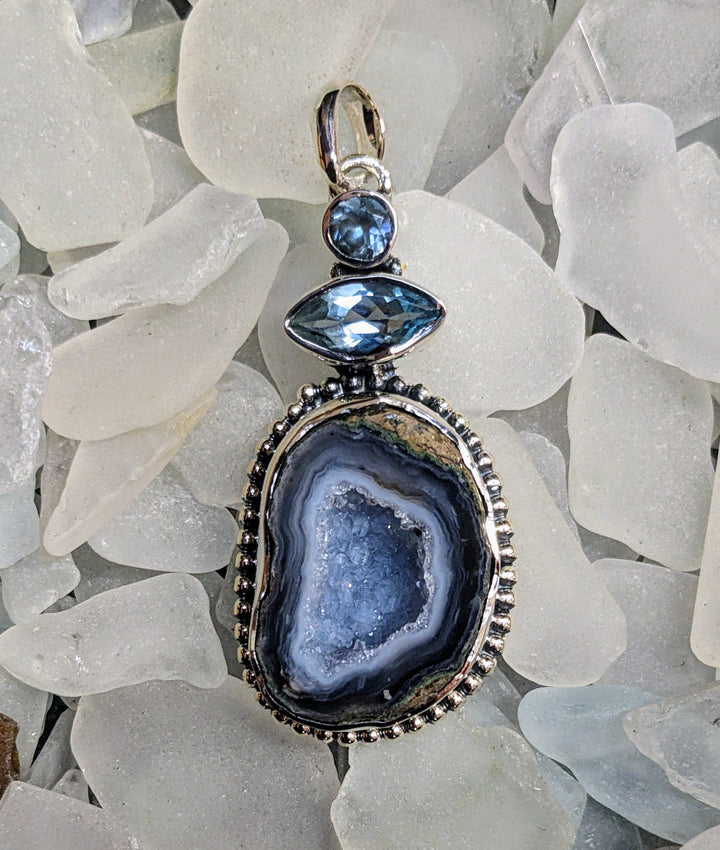 Beautifully Crafted Druzy and Blue Topaz Pendant - Floating Lotus