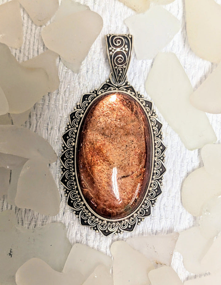 Cleansing and Joyful Sunstone Pendant - Floating Lotus