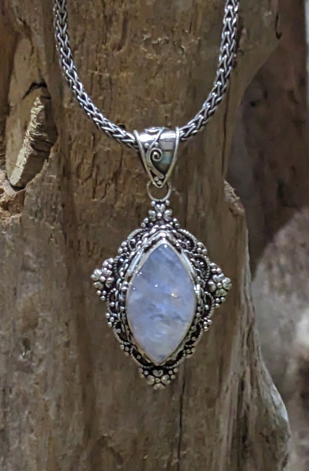 Exquisitely Crafted Moonstone Pendant - Floating Lotus