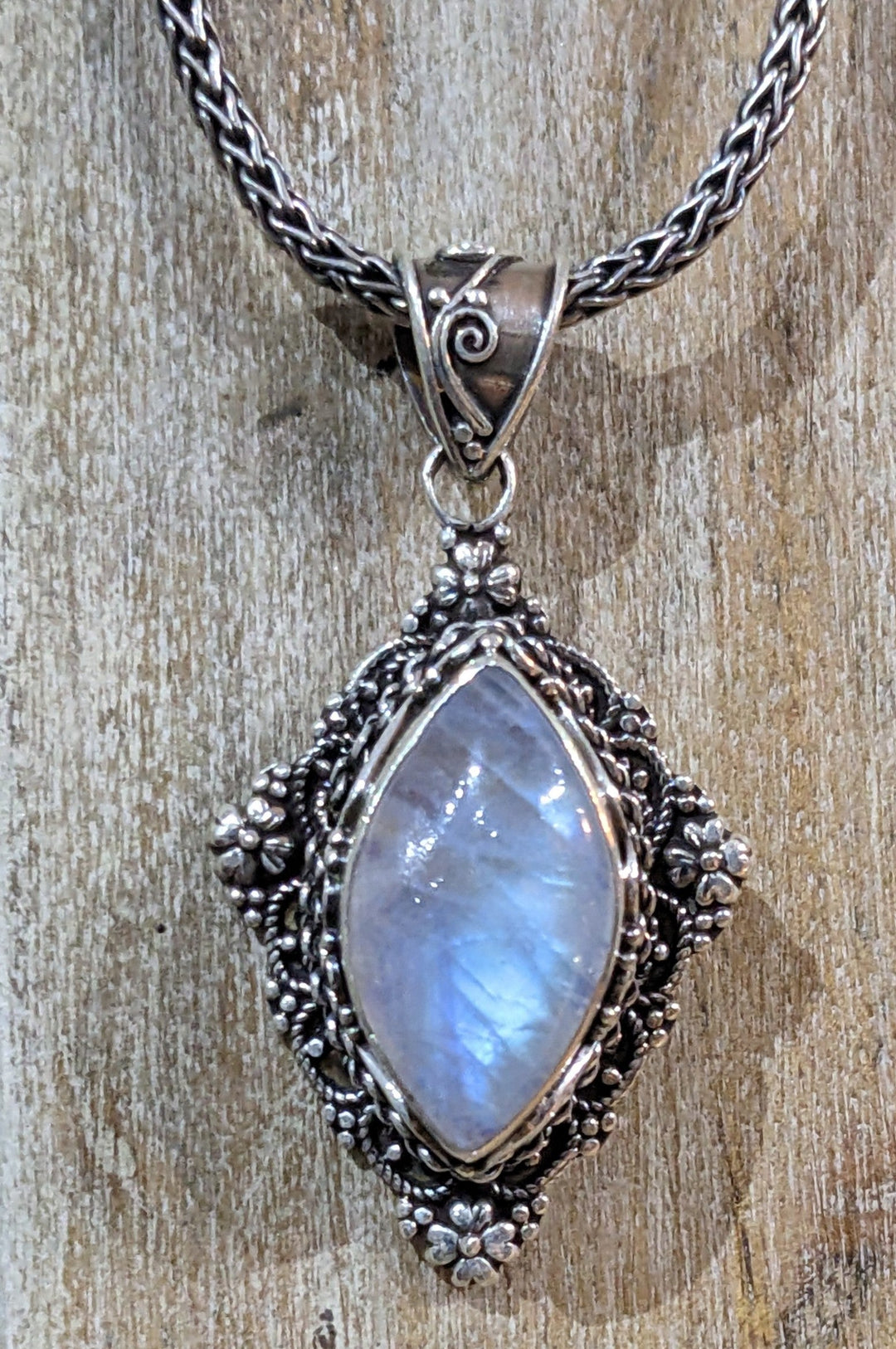 Exquisitely Crafted Moonstone Pendant - Floating Lotus