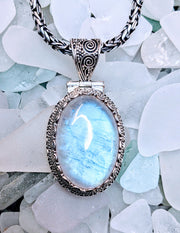 Lovely Moonstone Pendant with Intricate Detail - Floating Lotus