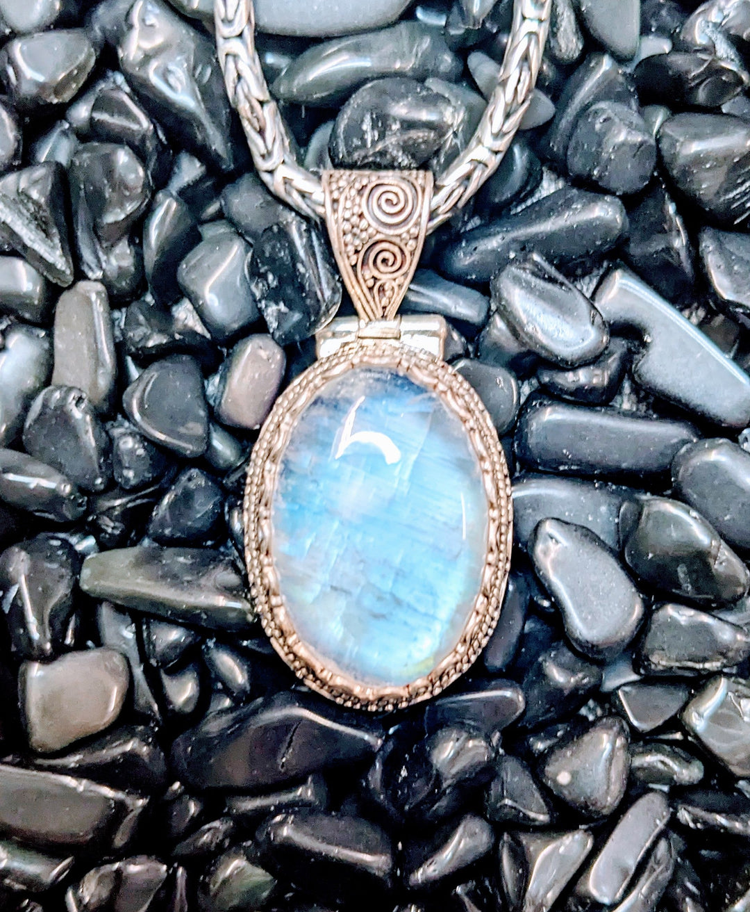 Lovely Moonstone Pendant with Intricate Detail - Floating Lotus