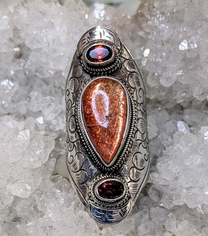 Stunning Sunstone with Garnet Ring - Floating Lotus